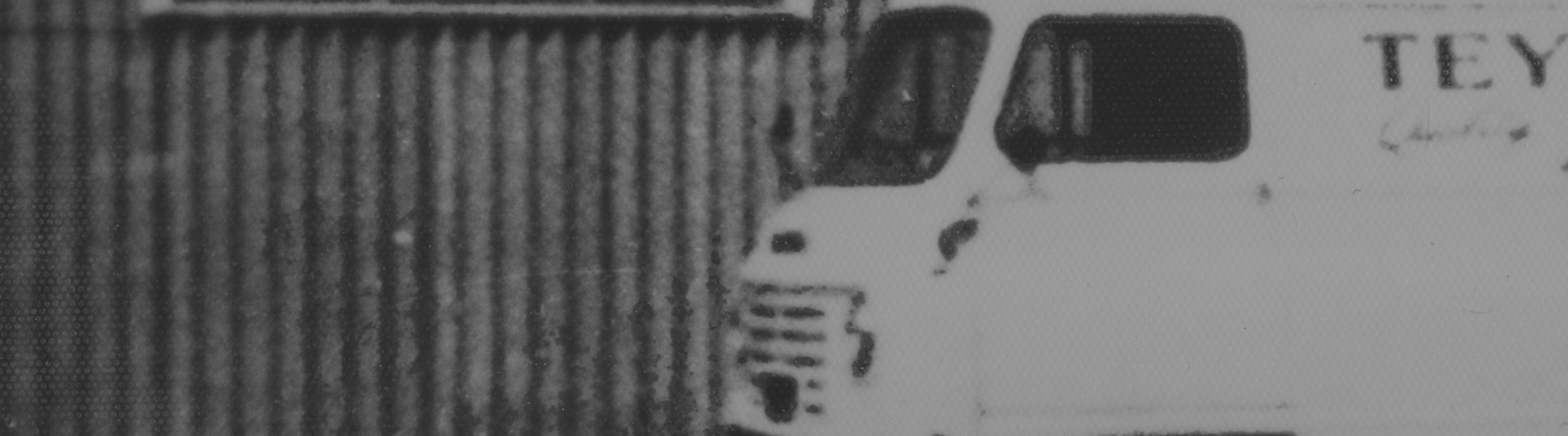 Black and white vintage image of Four Butchers van from “date here”