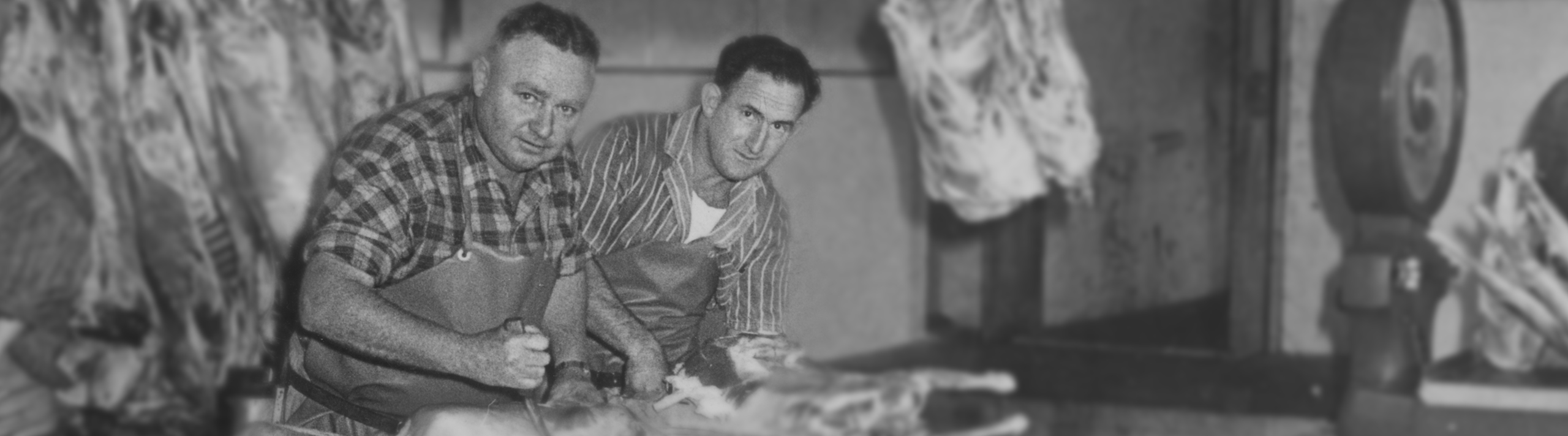 Black and white vintage image of Four Butchers van from “date here”